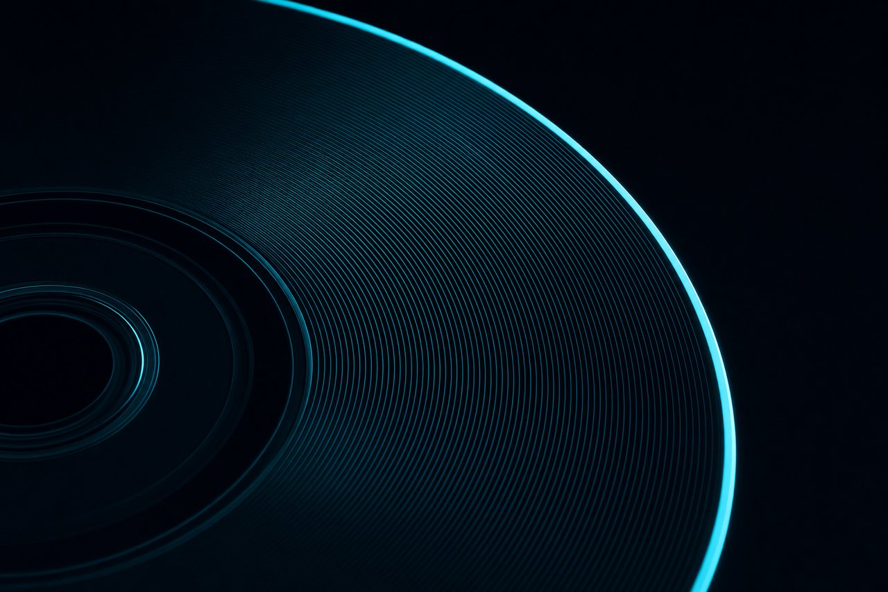 Macro close-up of a DVD's data side showing the fine concentric data tracks.